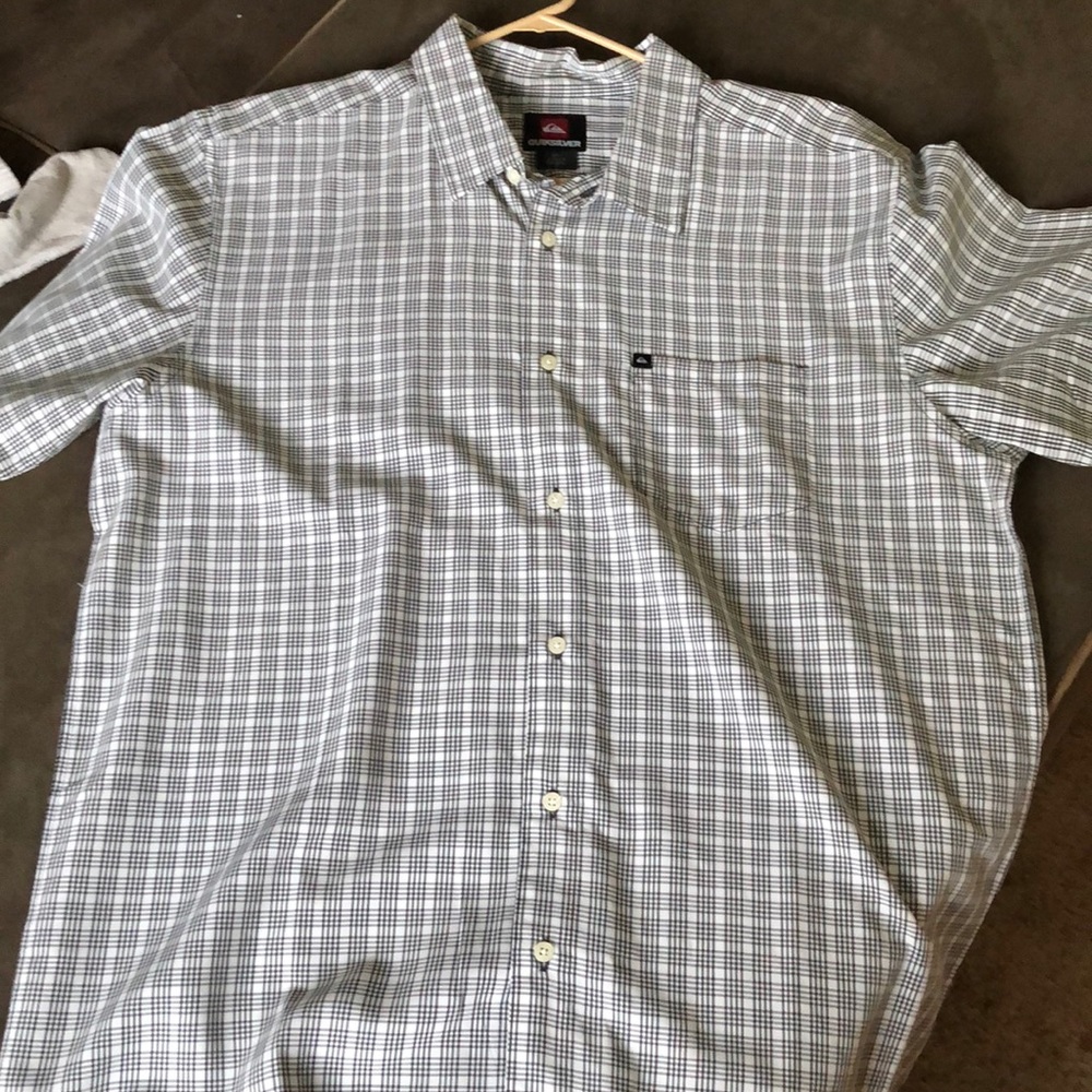 Button up. Short sleeve. Checkered